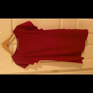 Airy burgundy dress with white trim.